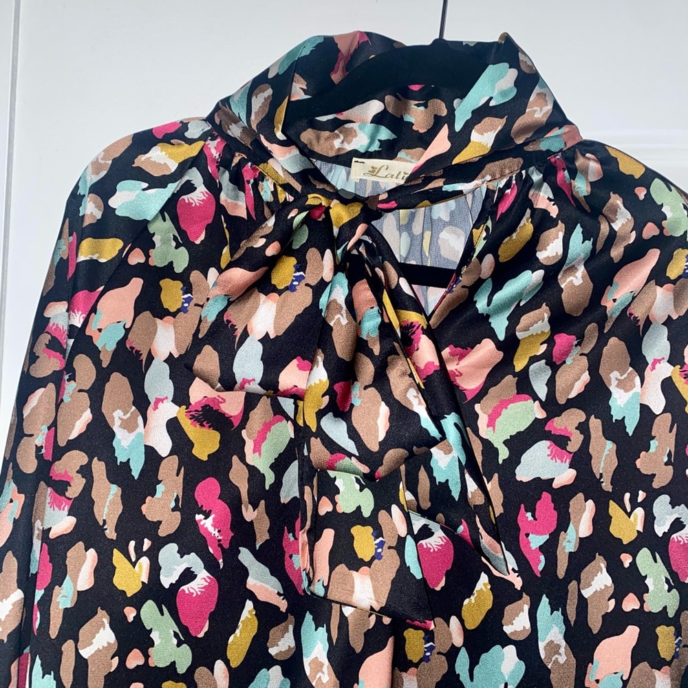 NWOT: Purchased in London, shirt with neck bow (L)